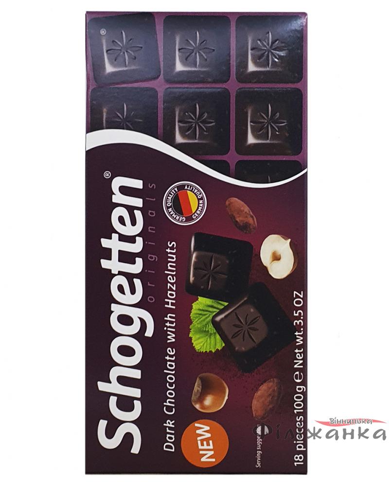 Темный шоколад с обжаренными кусочками фундука Schogetten Dark&Nuts 100 г (56009)