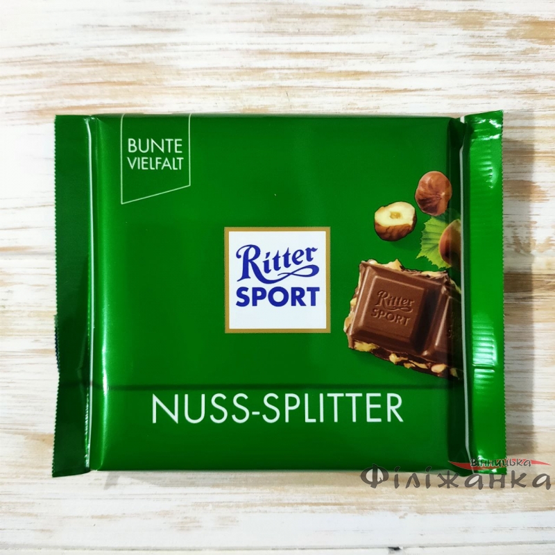 Молочний шоколад з подрібненим фундуком Ritter Sport Nuss-Splitter 100 г (57565)